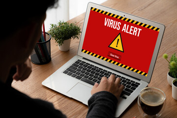 Wall Mural - Virus warning alert on computer screen detected modish cyber threat , hacker, computer virus and malware
