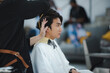 © chokniti - Personalized Hair Care Service: Professional Hairdresser Pampers Clients at Salon, Providing Expert Coiffure and Styling, A Beautiful Experience in Hair Care and Fashionable Cuts by Skilled Beautician