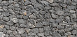 © MaraCandelaria - Panoramic texture of natural volcanic stone wall from Tenerife Island, Spain