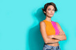 © deagreez - Photo of moody unsure lady dressed colorful top arms crossed looking empty space isolated turquoise color background