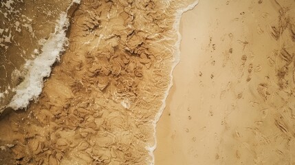 Wall Mural - Top down footage of beach sand and surface captured with a drone camera