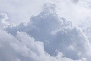 Wall Mural - a cloudy sky with a large cloud in the middle