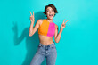 © deagreez - Photo of confident excited lady dressed colorful top showing two v-signs looking empty space isolated turquoise color background