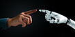 © khunkornStudio - Human and robot hands reaching out to touch. Symbolizes human-AI interaction, futuristic cooperation. Technology and innovation concept. Cybernetic partnership.