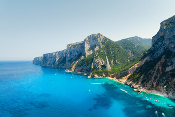 Wall Mural - drone view of the sea coast. motor boats and yachts in the lagoon. rocky shore and sea water. vacati