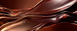 © wolfhound911 - Chocolate background with smooth, flowing waves of chocolate fondue.