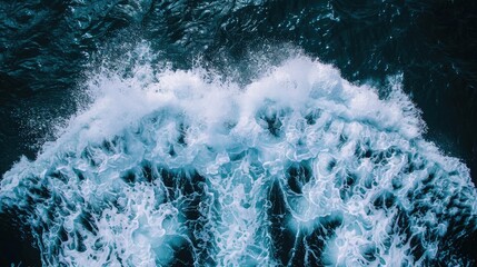 Wall Mural - aerial top view background photo of ocean sea water white wave splashing in the deep sea