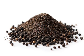 Poster - A pile of black pepper sits on a white surface, ready for use in cooking or as a decorative element