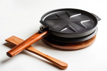 Poster - A wooden spoon lying on a clean white surface, great for still life photography or kitchen decoration