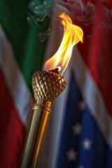 Aufkleber - A close-up shot of a torch with a flag waving in the background, suitable for use in patriotic or celebratory contexts