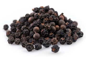 Poster - A pile of black pepper seeds sitting on a white surface, ideal for use in food, cooking, or spice-themed illustrations