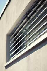 Aufkleber - A close-up shot of a window with blinds, ideal for interior design or home decor use