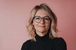 © LukaszDesign - Portrait of woman with glasses on pink background, studio shot, and happy. Happy woman, face and glasses for fashion, eye care, frame, cosmetic beauty, or lens choice.