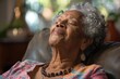© ChaoticMind - Senior black woman relaxing with eyes closed