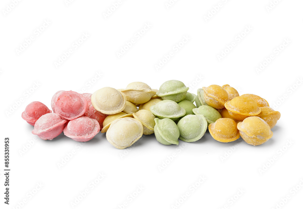 Colorful raw dumplings on white background