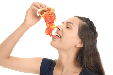 Canvas Print - Beautiful young woman with slice of tasty pizza isolated on white background