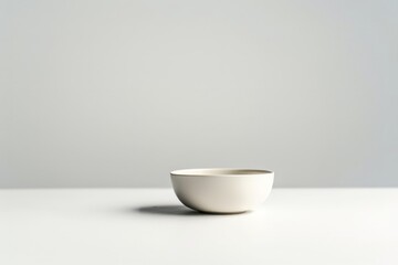 Wall Mural - Minimalist Ceramic Bowl on White Surface