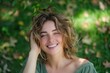 © LifeMedia - Woman with a joyful smile enjoying the greenery of nature as a serene backdrop, embodying relaxation and contentment