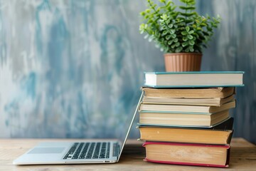 Wall Mural - stack of books with laptop on wooden table education and technology concept with copy space