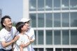 © kapinon - 夏のお出かけやレジャーのイメージの横顔や都会のマンションなどのイメージ
