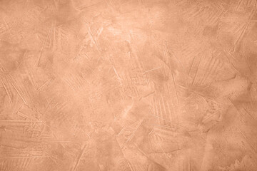 Wall Mural - Stone surface of peach fuzz color, top view. Trendy shade of 2024 year