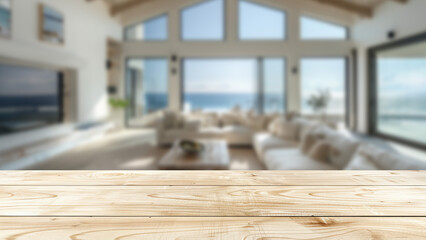 Wall Mural - Empty table top with a coastal living room in soft focus behind, providing a pristine setting for advertising and product displays.
