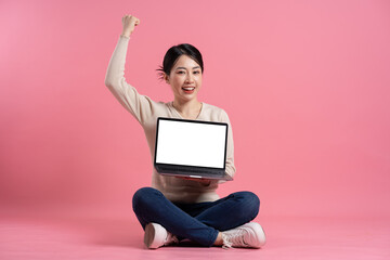 Wall Mural - Image of beautiful Asian woman posing on a white background