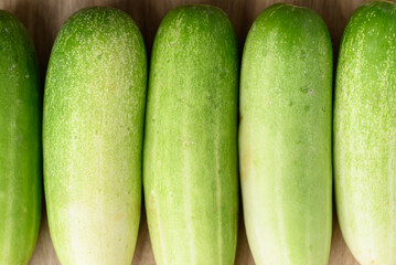 Wall Mural - Fresh cucumber texture background, Organic vegetable, Food ingredient