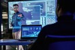 © standret - Talking about project. Male business trainer is against projector with data, teaching people