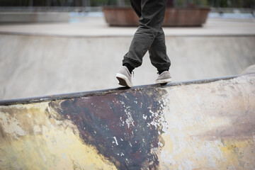 Wall Mural - parkour jumping on steel pipe with balance