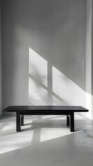 Wall Mural - Minimalist Black Table with Clean Lines Against White Studio Backdrop