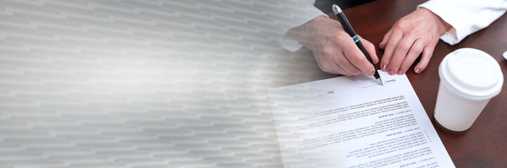 Poster - Hand of businesswoman signing a document (lorem ipsum text used); panoramic banner