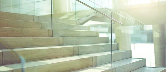 Poster - Stairs with glass railing for go upstairs. Selective focus. with copy space image. Place for adding text or design