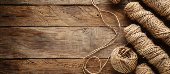 Aufkleber - Hemp cloth with threads on wooden background, closeup. Copy space image. Place for adding text or design
