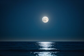 Wall Mural - the full moon reflected bright light on the dark ocean.