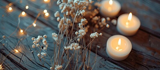 Aufkleber - White dried flowers on a wooden table with candles. with copy space image. Place for adding text or design