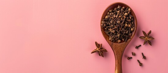 Aufkleber - clove on spoon pastel background Food  Isolated  Herb. with copy space image. Place for adding text or design