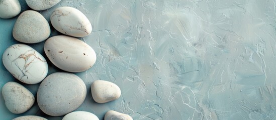 Poster - White River Pebble Stone. On a pastel background.  Texture. with copy space image. Place for adding text or design