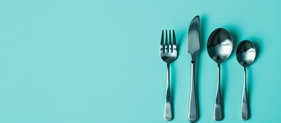 Aufkleber - stainless steel cutlery on a isolated on pastel background. with copy space image. Place for adding text or design