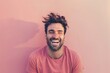 © CogniLens - Portrait of a joyful man in his 30s laughing in front of solid pastel color wall