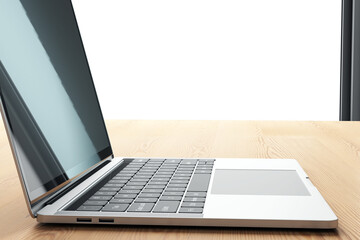 Poster - Side view of an open laptop on a wooden surface against a white background, technology and workspace concept. 3D Rendering