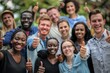 © MD Media - Group of friends having fun together outdoors. Happy joyful friends cheering. happy volunteer group pointing towards camera.