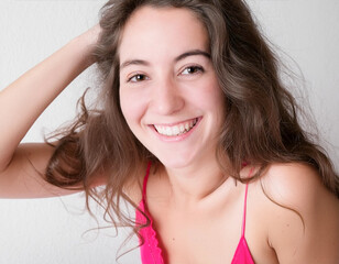 Wall Mural - Young woman cute cheerful smile showing off natural beauty and healthy skin happy on a white background