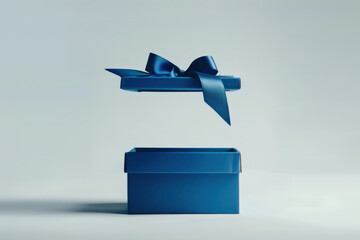 Wall Mural - Elegant blue gift box with its lid floating above, revealing the empty space inside