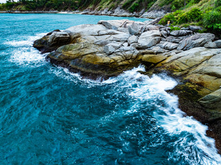 Poster - Amazing seascape view seashore and big waves crashing on rocks, Aerial view waves sea surface in Phuket island Thailand,Travel and business tour website background concept