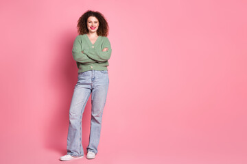 Wall Mural - Photo of positive lovely woman wear stylish khaki clothes standing empty space isolated on pink color background
