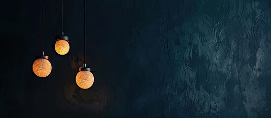 Wall Mural - Local shaped lamps on ceiling against dark background. Copy space image. Place for adding text and design