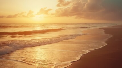 Wall Mural - A serene image of a tranquil beach at sunrise, with soft golden light illuminating the calm waves and gentle sea breeze, providing a peaceful setting for meditation and mindfulness