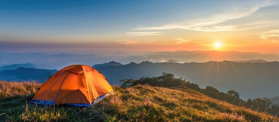 Sticker - camping tent in the top of mountain in the morning. copy space image. place for adding text or desig