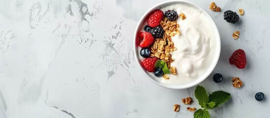 Wall Mural - Healthy breakfast. Bowl of yogurt with granola and berries. Copy space image. Place for adding text or design